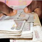 Hands Holding Money Image